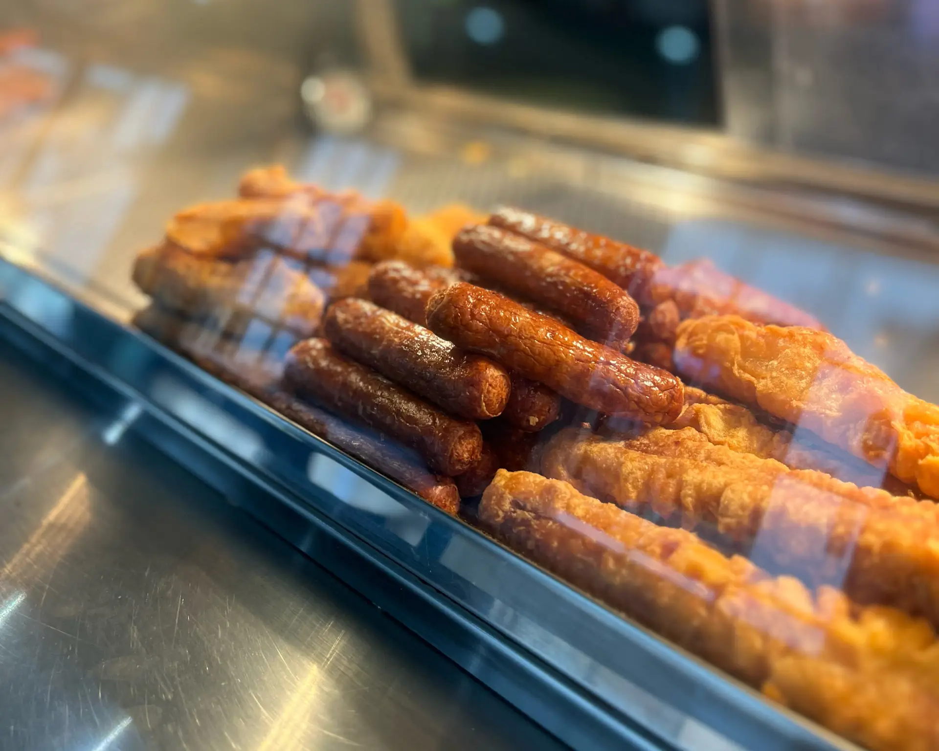 Battered sausage in fish and chip shop